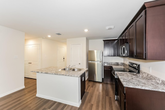932 Dawson St, Waco, TX 76704 - kitchen with dark wood-style floors, visible vents, stainless steel appliances, and a sink