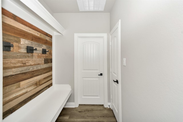 mudroom with wood finished floors and visible vents