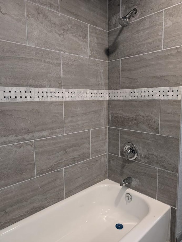 4301 Wilhelm St, Fort Worth, TX 76119 - bathroom featuring washtub / shower combination