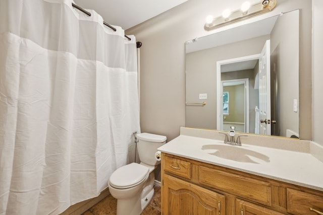 bathroom with vanity, toilet, and a shower with curtain
