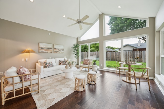 sunroom / solarium featuring a wealth of natural light and beamed ceiling