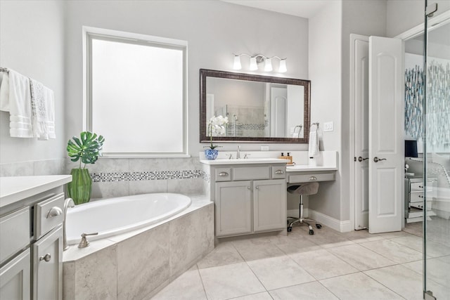 full bath featuring tile patterned floors, a shower with shower door, a garden tub, and vanity