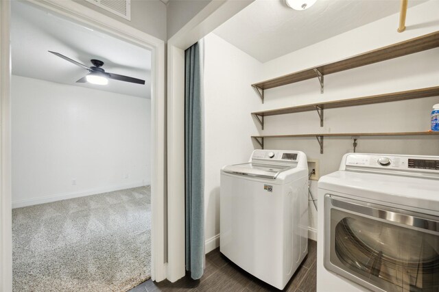 clothes washing area featuring washer and dryer, laundry area, ceiling fan, baseboards, and visible vents