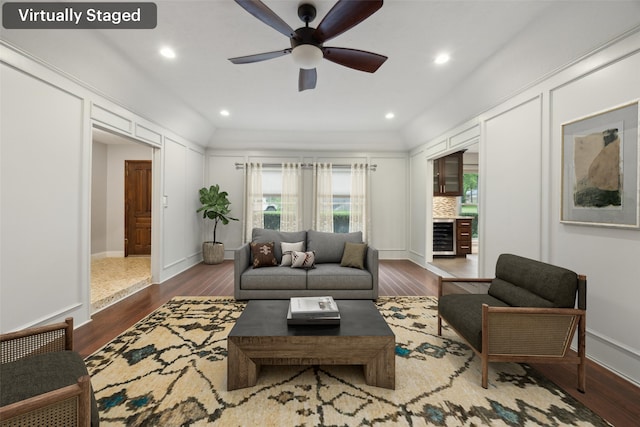 living area featuring wine cooler, ceiling fan, recessed lighting, and wood finished floors