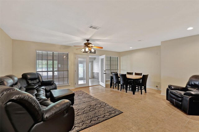 living area with visible vents, baseboards, ceiling fan, recessed lighting, and light tile patterned floors