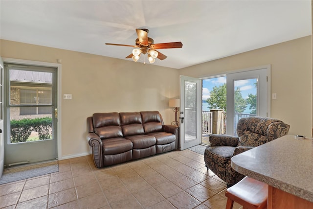 living room featuring a ceiling fan