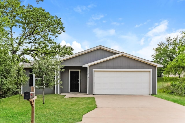 ranch-style house with an attached garage, a front lawn, and concrete driveway