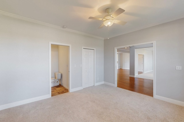 2609 Comanche Moon Dr, Fort Worth, TX 76179 - unfurnished bedroom featuring ceiling fan, crown molding, baseboards, carpet flooring, and ensuite bath