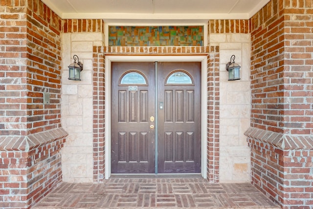 2609 Comanche Moon Dr, Fort Worth, TX 76179 - doorway to property featuring brick siding