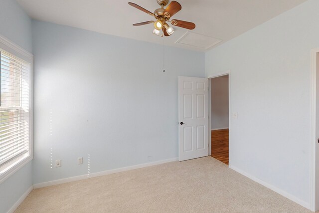 2609 Comanche Moon Dr, Fort Worth, TX 76179 - unfurnished room with baseboards, carpet flooring, ceiling fan, and attic access