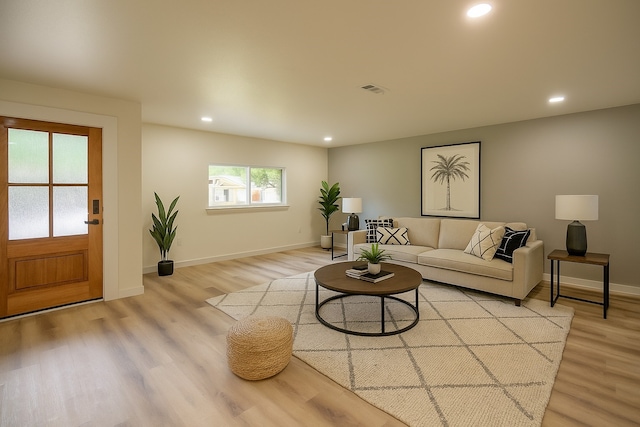 1830 Bosque Dr, Garland, TX 75040 - living room featuring light wood-type flooring and recessed lighting