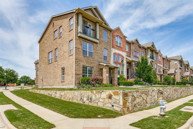 view of property with a residential view