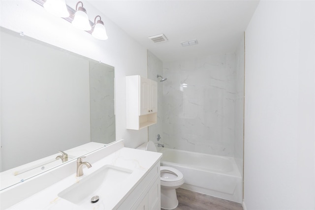 7404 Maybrook Ct, Plano, TX 75024 - full bath featuring toilet, shower / bathtub combination, wood finished floors, and vanity