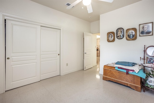 bedroom with visible vents, ceiling fan, a closet, and baseboards