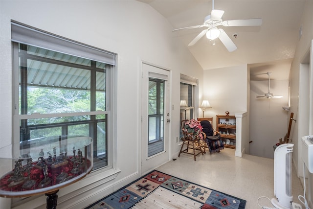 entryway featuring ceiling fan and vaulted ceiling