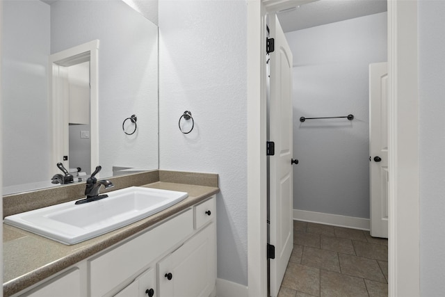 727 S Sugartree Dr, Lipan, TX 76462 - bathroom with vanity and baseboards