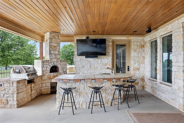 727 S Sugartree Dr, Lipan, TX 76462 - view of patio / terrace with a grill, a sink, area for grilling, and outdoor wet bar