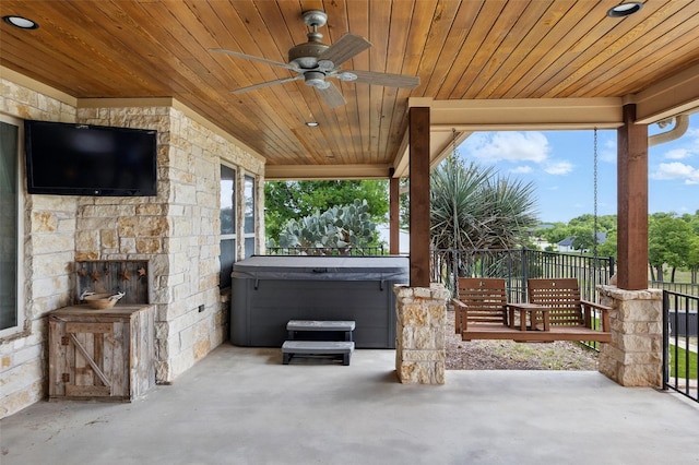 727 S Sugartree Dr, Lipan, TX 76462 - view of patio / terrace with a ceiling fan, fence, and a hot tub