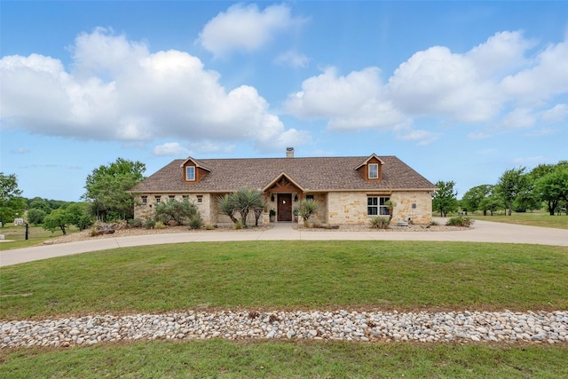 727 S Sugartree Dr, Lipan, TX 76462 - view of front of property featuring a front yard, a chimney, curved driveway, and stone siding