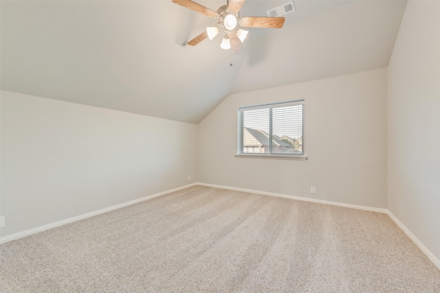 bonus room with carpet, baseboards, visible vents, a ceiling fan, and lofted ceiling