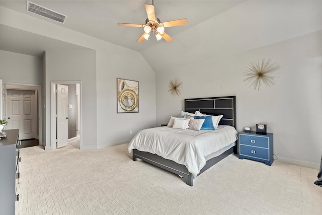carpeted bedroom with visible vents, ceiling fan, vaulted ceiling, and baseboards