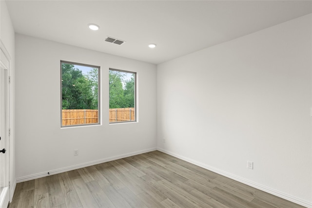 802 Roanoke, Princeton, TX 75407 - empty room featuring light wood-style flooring, baseboards, and recessed lighting