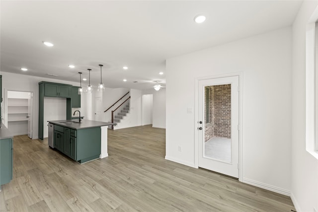 802 Roanoke, Princeton, TX 75407 - kitchen featuring green cabinets, recessed lighting, a sink, and light wood-style flooring