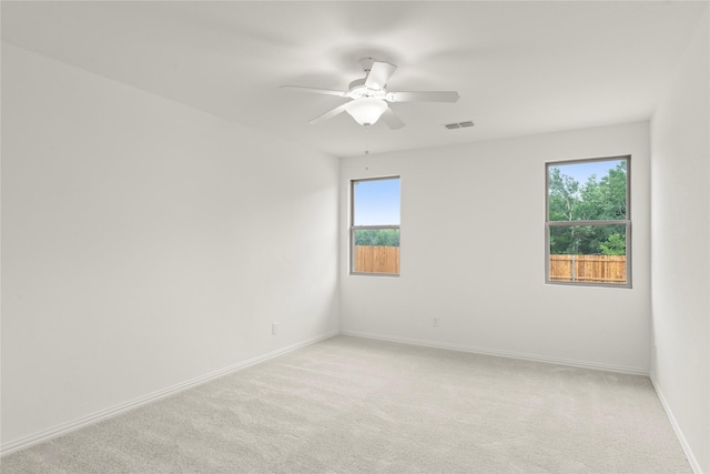 802 Roanoke, Princeton, TX 75407 - spare room with ceiling fan, light colored carpet, and baseboards
