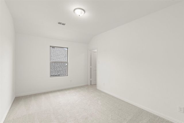 802 Roanoke, Princeton, TX 75407 - empty room with light carpet, baseboards, and lofted ceiling