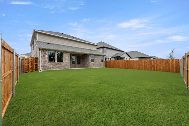 802 Roanoke, Princeton, TX 75407 - rear view of house featuring brick siding and roof with shingles