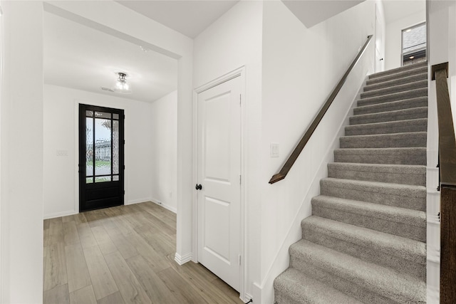 802 Roanoke, Princeton, TX 75407 - entryway featuring stairway, wood finished floors, and baseboards