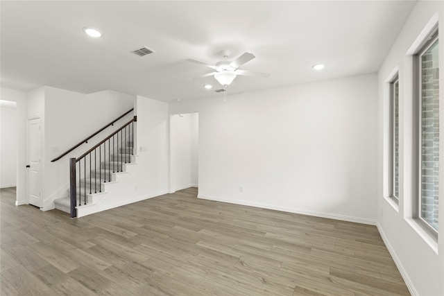 802 Roanoke, Princeton, TX 75407 - unfurnished living room with ceiling fan, light wood-type flooring, stairway, recessed lighting, and baseboards