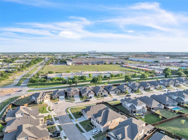 birds eye view of property with a residential view