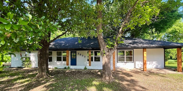 3893 Fm 546, Princeton, TX 75407 - ranch-style home featuring a porch and brick siding
