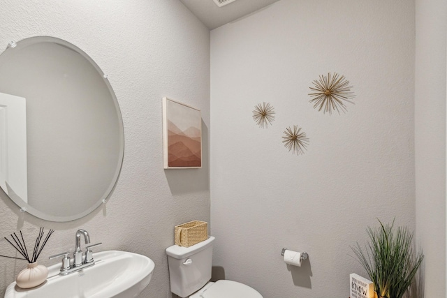 2129 Gill Star Dr, Haslet, TX 76052 - bathroom featuring a sink and toilet