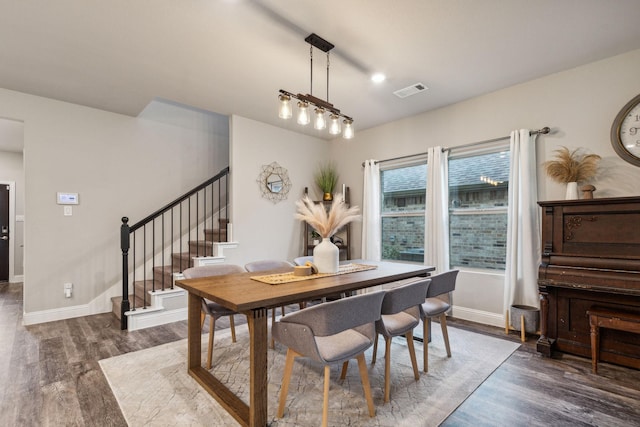 2129 Gill Star Dr, Haslet, TX 76052 - dining area with stairway, wood finished floors, and baseboards