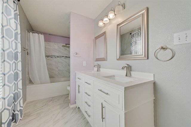 full bathroom featuring double vanity, a sink, marble finish floor, and shower / bath combo with shower curtain
