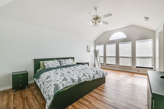 12165 Shoal Creek Dr, Frisco, TX 75035 - bedroom featuring lofted ceiling, wood finished floors, and a ceiling fan