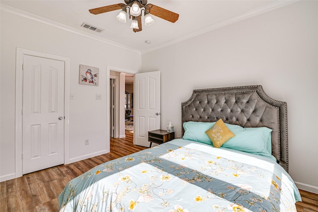 12165 Shoal Creek Dr, Frisco, TX 75035 - bedroom featuring wood finished floors, crown molding, baseboards, and ceiling fan