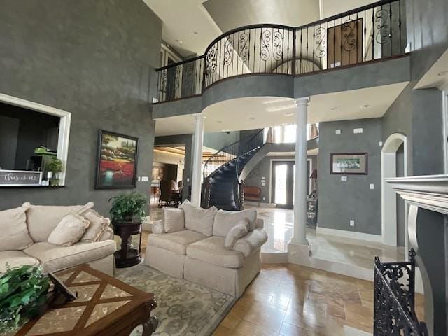 1900 Durance Ct, Corinth, TX 76210 - living area with a high ceiling and decorative columns