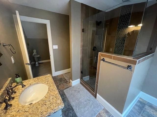 1900 Durance Ct, Corinth, TX 76210 - bathroom with a stall shower, vanity, and baseboards
