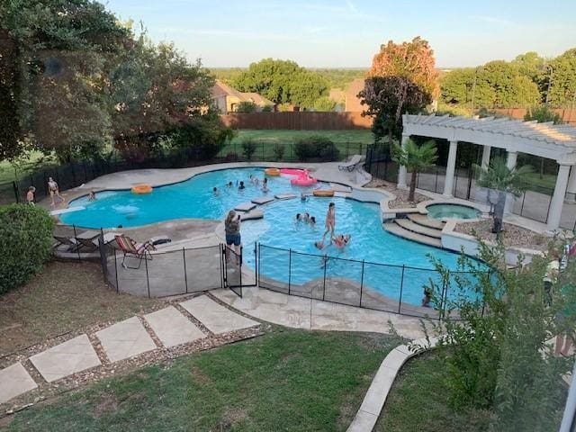 1900 Durance Ct, Corinth, TX 76210 - view of pool featuring fence, a pergola, and an in ground hot tub