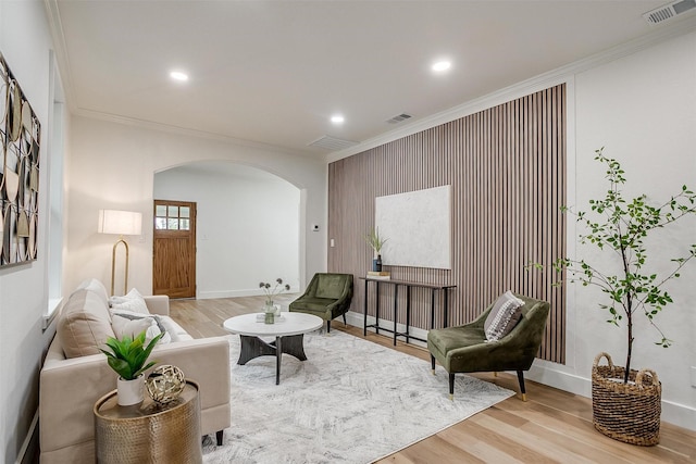 5105 Birchman Ave, Fort Worth, TX 76107 - living area featuring visible vents, arched walkways, and crown molding
