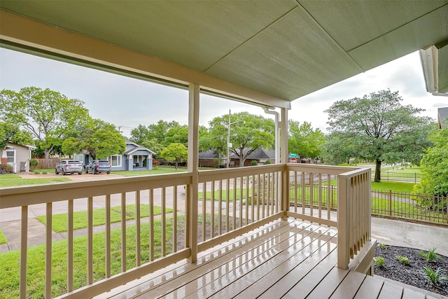 5105 Birchman Ave, Fort Worth, TX 76107 - wooden deck featuring a lawn, a porch, and a residential view