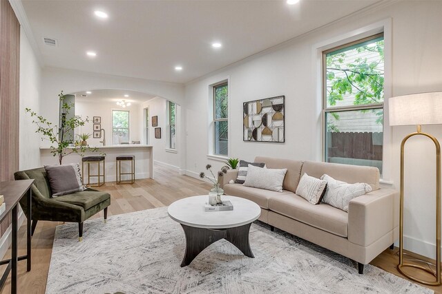 5105 Birchman Ave, Fort Worth, TX 76107 - living area with recessed lighting, crown molding, visible vents, arched walkways, and plenty of natural light