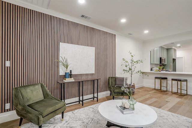 5105 Birchman Ave, Fort Worth, TX 76107 - living area with wood finished floors, recessed lighting, crown molding, and baseboards