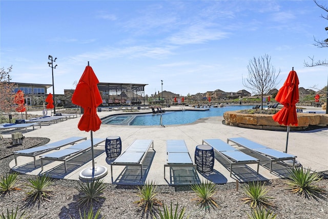 community pool with a patio