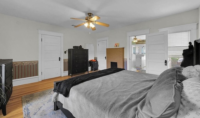 bedroom featuring ceiling fan and wood finished floors