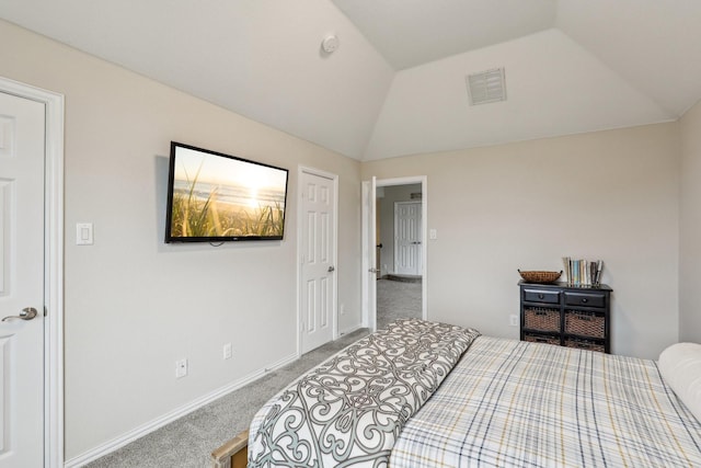 bedroom featuring lofted ceiling, visible vents, carpet floors, and baseboards