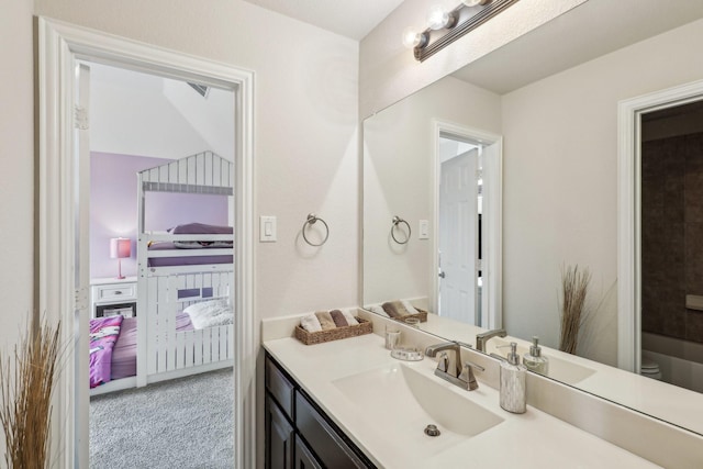 bathroom with toilet and vanity